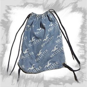 Drawstring denim hollister sling back pack